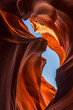 © Andreas Wonisch/Stocksy - Colorful sandstone formations below the sky in Lower Antelope Canyon