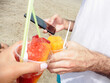 © Mal de Ojo Studio/Stocksy - Holding Shaved Ice at Beach