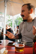 © Mal de Ojo Studio/Stocksy - Casual Conversation at Cafe