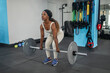 © Lupe Rodríguez/Stocksy - black woman doing sports in a gym
