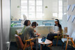 © BONNINSTUDIO/Stocksy - Business people having a productive meeting in modern office