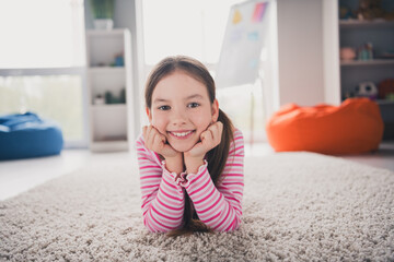 Sticker - Full size photo of small cute daughter lying floor soft carpet dreamy cute education home schooling isolated indoors