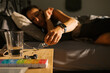 © Serena Burroughs/Stocksy - woman waking up from sleep in the morning and getting eyeglasses