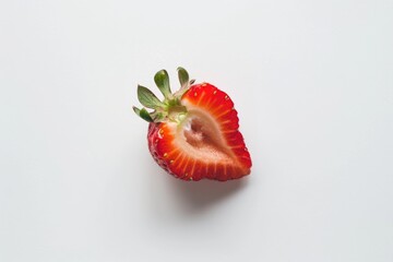 Half of ripe strawberry isolated on white background. Single cut or bitten fresh red berry