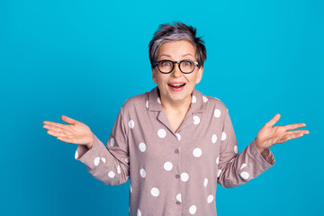 Sticker - Photo of lovely pretty senior woman wear stylish pajama rejoice unexpected sale isolated on blue color background