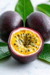 Poster - Closeup of a fresh passion fruit with green leaves