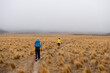 © Thomas Pickard/Stocksy - Kids backpacking, South Island, New Zealand.