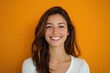 © kinara art design - Portrait of a Smiling Woman with Long Brown Hair Against an Orange Background