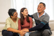 © Art_Photo - Portrait enjoy happy smiling love asian family.Senior mature father hug with elderly mother and young adult woman play laughing and having fun together at home.insurance concept