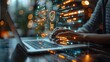 © nirabs_creative - A person is typing on a laptop with a shopping cart icon on the screen. Concept of online shopping and the convenience of shopping from the comfort of one's home