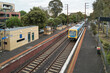 © Rowena Naylor/Stocksy - Train Arriving at Platform at Melbourne suburban station