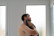 © Alba Vitta/Stocksy - Man Washing Face