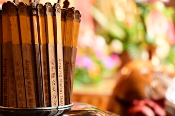 Taiwan - Jul 09, 2024: Close-up of divination tubes at Anping Kaitai Tianhou Temple, where worshippers seek spiritual guidance through fortune-telling and divine communication.