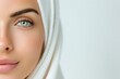 © AlexCobalt - Serene Beauty in White Hijab with Flawless Complexion and Striking Green Eyes