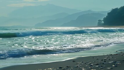 Wall Mural - gentle waves lap the shore under a soft sunrise, surrounded by serene mountains and a peaceful coast