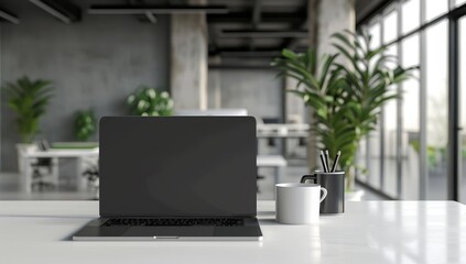 Laptop, Coffee Mug, and Pencils on a White Table in a Modern Office