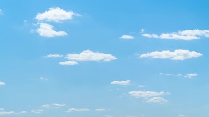 Wall Mural - beautiful blue sky with soft white clouds timelapse for abstract background