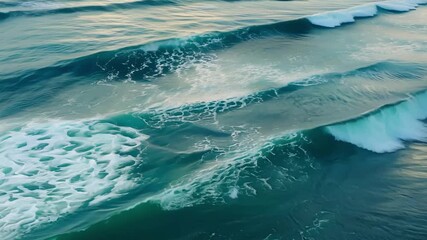Wall Mural - gentle waves roll onto the shore, reflecting the soft colors of dusk, creating a peaceful coastal at