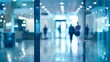 © adri - Blurred View of People Walking Through a Glass Doorway in a Modern Office Building