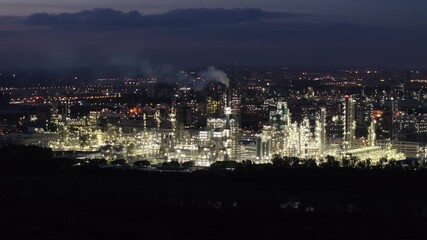 Wall Mural - Refinery at night with lighting effects