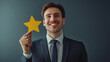 © WARIS ALI - A businessman smiling and holding up a card or, symbolizing excellent service