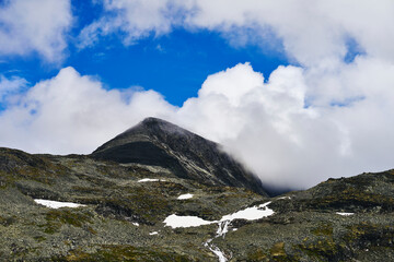 Wall Mural - A mountain of the Hurrungane Mountains in western Jotunheimen, Norway. Seen from the Tindevegen Road.