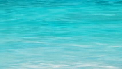 Wall Mural - Clear turquoise ocean water gently rippling under sunlight in tropical paradise