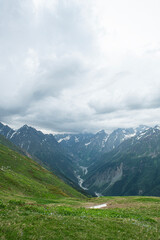 Magnificent mountains to trek in Mestia. Blooming mountain views in snowy weather in Mestia Georgia. Magnificent Mestia mountain views. Koruldi Lake trekking route.