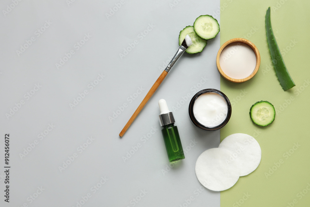 Composition with natural cosmetics, ingredients and cotton pads on color background