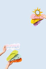 Wall Mural - Hands holding flip flops with paper sun and paper with word SUMMER on blue background