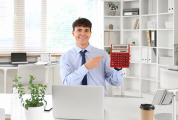 Sticker - Male accountant pointing at calculator at workplace in office