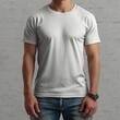 © AnamulHaqueAnik - Plain white t-shirt displayed on male model against neutral background