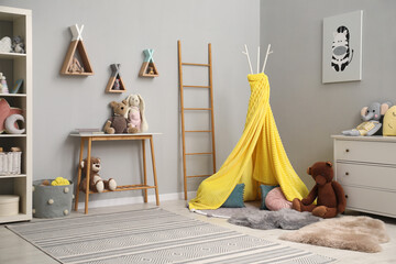 Wall Mural - Stylish child room interior with modern furniture, toys and play tent