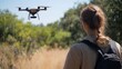 © AUAChanel - Robotic wildlife conservation project, teams testing tracking drones and ground robots, simulated natural environments, collaborations between zoologists and engineers, data analysis stations, focus