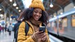 © Boraryn - Woman Using Phone at Train Station