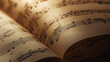 © Curioso.Photography - Open sheet music book with detailed musical notes illuminated by warm light.