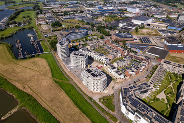 Former De Mars now Noorderhaven neighbourhood in Zutphen, The Netherlands with new high rise apartment buildings at the riverbed. Urban development, engineering and housing market