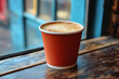 © Infinity Lens - A red eye coffee with a splash of espresso in a to-go cup.