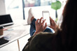 © A. Frank/peopleimages.com - Hands, phone screen and relax with design employee at desk of office for social media management. Break, communication and text message with app check in business workplace for online research