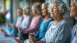 © Wattana - Seniors participating in a yoga class.