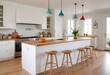 © Anyket - A modern kitchen with a wooden countertop, white cabinets, and pendant lights. The kitchen has a minimalist and clean design with a mix of natural and industrial elements
