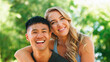 © Monkey Business - Happy Couple Smiling Outdoors in Bright Green Park During Daytime