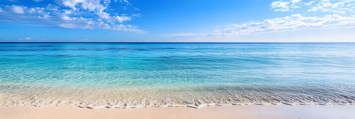 Calm blue ocean with sandy beach