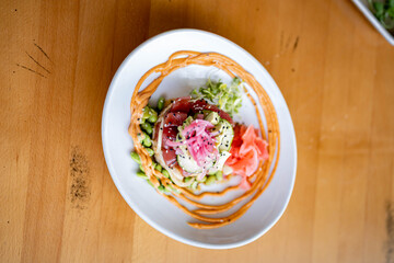 Tuna Poke Rice tower at gourmet beachfront restaurant 