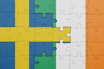 puzzle with the colourful national flag of ireland and flag of sweden.