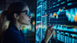 © Suriyo - Businesswoman analyzing stock market data.