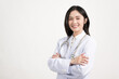 © arcyto - Portrait female doctor wearing medical uniform and stethoscope at hospital.Beautiful smiling young asian woman doctor isolated on white background.Doctor arms crossed wear white coat and stethoscope.