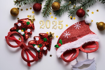 Wall Mural - abstract background of christmas attributes with the year number 2025.