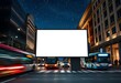 © Anyket - A large blank billboard in the middle of a city street at night, with blurred traffic and buildings in the background