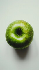 Wall Mural - green fresh apple on a grey background